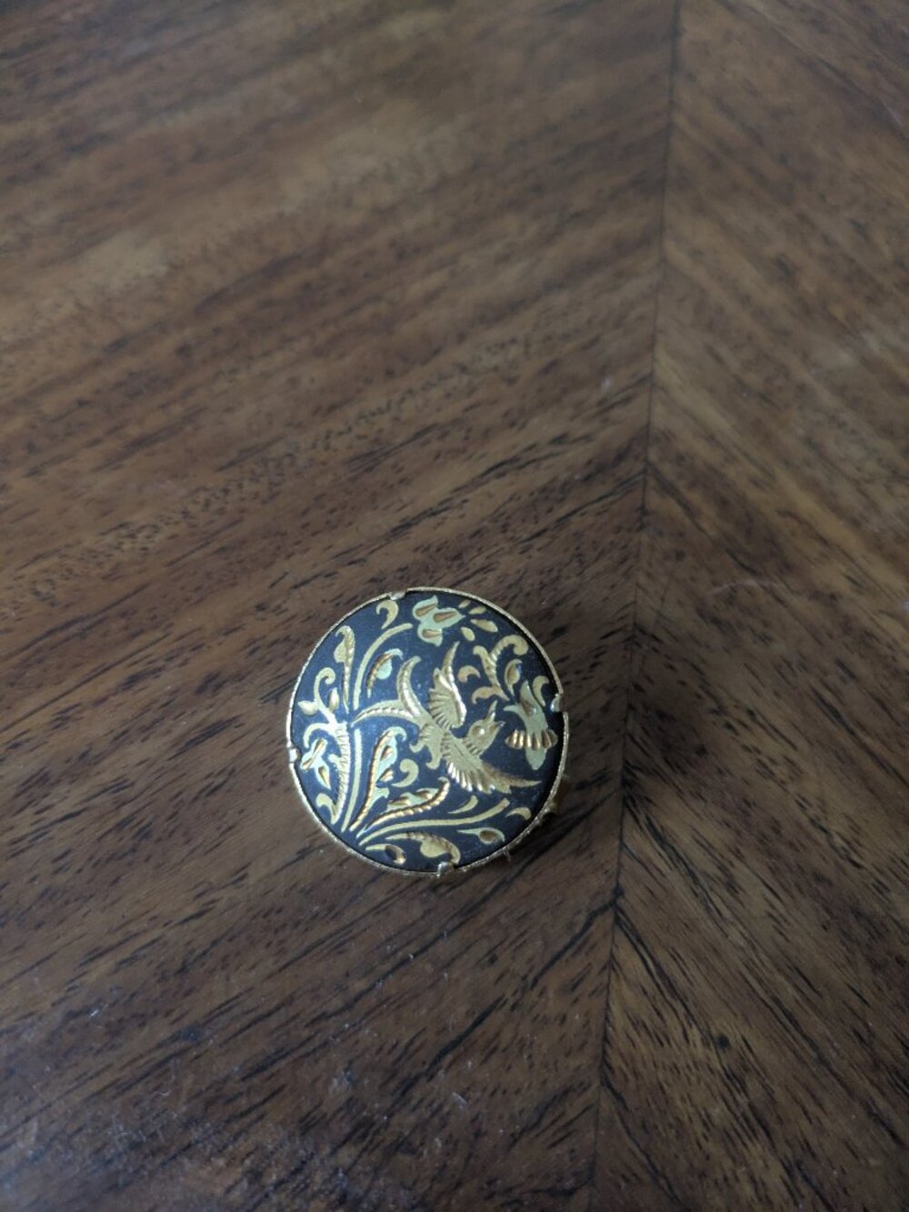 Vintage damascene bird brooch